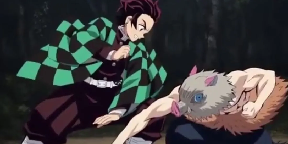 Inosuke Hashibira và Tanjiro Kamado trong Demon Slayer, cạnh tranh vui vẻ từ phía Inosuke.