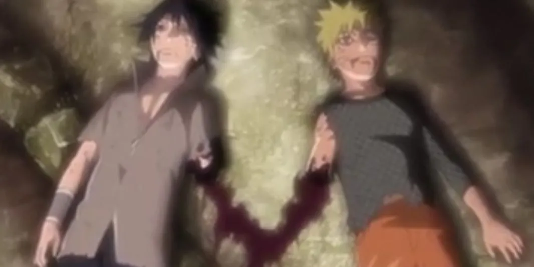 Naruto và Sasuke sau trận chiến cuối cùng, kiệt sức nằm cạnh nhau trên mặt đất.