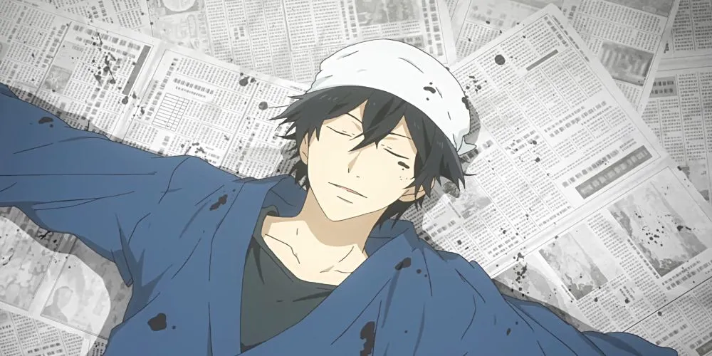 Seishuu Handa nằm trên báo phủ đầy mực trong anime Barakamon