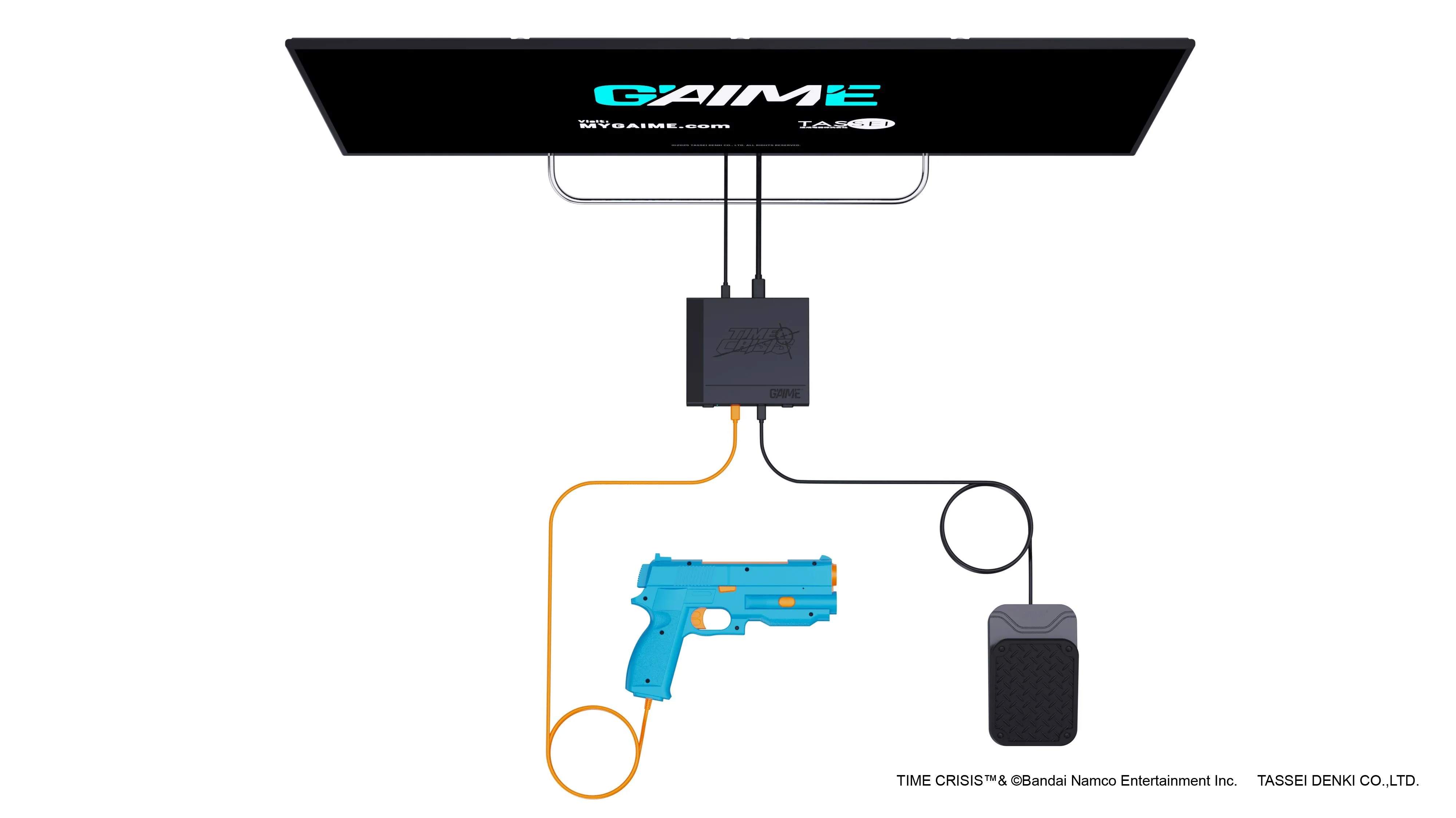Bộ thiết bị G'aim'e plug and play được đặt cạnh màn hình TV, sẵn sàng cho những trận đấu súng nảy lửa.
