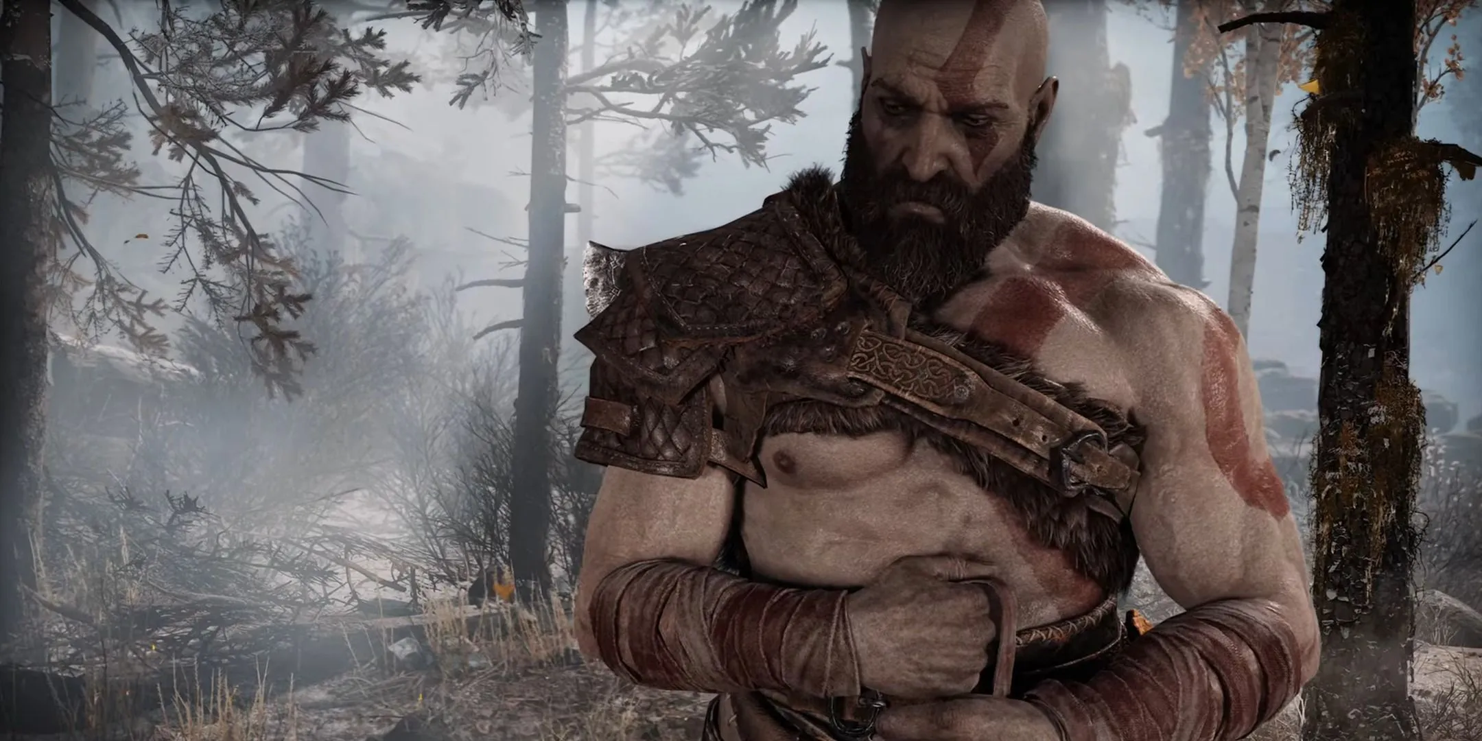 Chiến thần Kratos trong God of War (2018), đối mặt với quá khứ bạo lực và nỗ lực làm cha tốt cho Atreus.