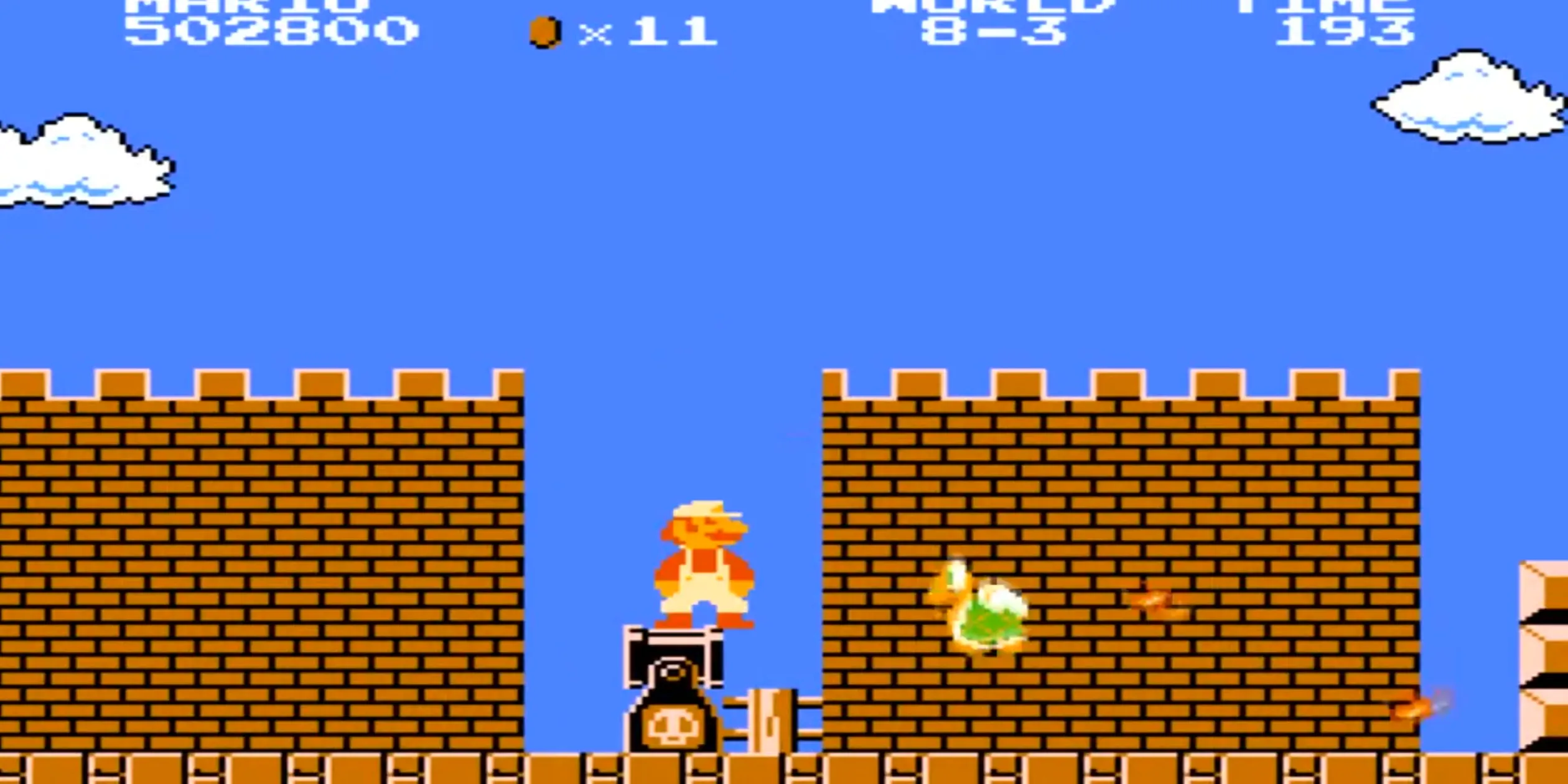 Mario nhảy giữa các khối với Hammer Bros trong World 8-3